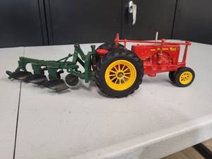 lot 193 image: Massey Harris Challenger Tractor with 3 bottom plow (Plow is broke)