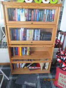 Vintage 4-tier Lawyers cabinet with glass front door fronts. measures approximately 361258