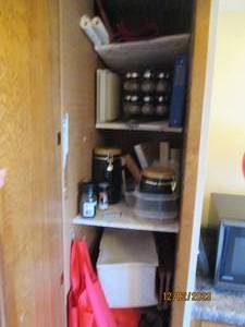 Content of left side kitchen pantry to Include Cookbooks, spice rack, storage canisters and more