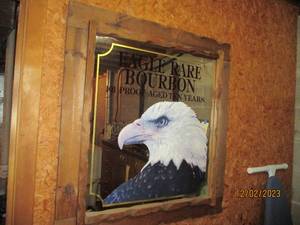 Eagle Rare Bourbon Designed mirror with wood frame approximately 31.533