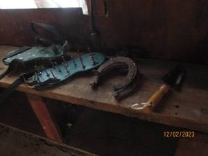 Turf ShoesSpikes, horseshoes and handheld garden shovel