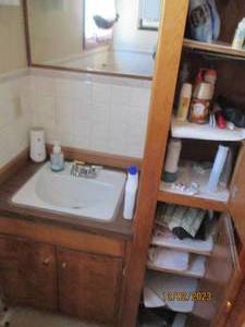 Content of master bathroom includes all personal care supplies, decor and medical equipment