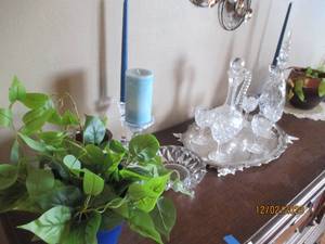 Cut crystal stemware, lidded server and decanter, candy dish and candle holders along with other pieces of decor and live plants