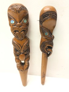 lot 18 image: Excellent Pair of Old Vintage Mori Carved Wood Clubs or Talking Sticks