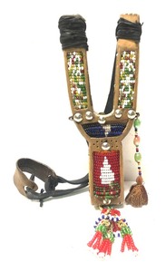 lot 141 image: Elaborately Decorated Tribal Slingshot 