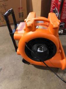 lot 8 image: RIDGID 1625 CFM 3-Speed Portable Blower Fan Air Mover with Collapsible Handle and Rear Wheels for Water Damage Restoration   Customer Returns  See Pictures