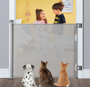 lot 247 image: Retractable  Safety Gate, Extra Wide  33 Tall, Extends to 55