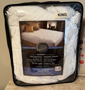 lot 104 image: New Sheets and Mattress Pads