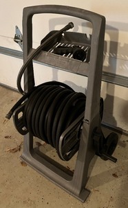 lot 324 image: Craftsman Hose Reel and Hose