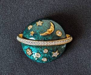 lot 22 image: Swarovski Celestial Moon and Stars Enamel Brooch