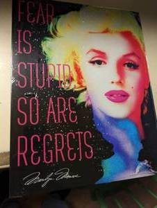 Regrets metal sign...