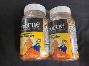 KK 2 Bottles of Airborne Vitamin C boosting gummy supplements