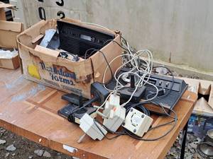 lot 673 image: Vintage Atari Game Console with (8) Controllers and SpareConsole, Cables and Misc. Parts