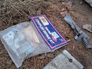 lot 734 image: Trailer Coupler Repair Kit and One Spare Coupler (in original packaging)