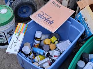 lot 776 image: Lot of (1 Tote) Misc. Painting Products - Sketch Pad, Oil Pastels, Silicone, Various Cans of Spray Paint
