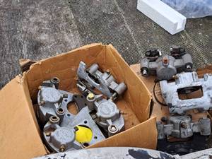 lot 826 image: Misc. Automotive Parts - Brake Parts - Calipers, Rotors and Pads