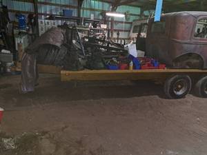lot 605 image: 18 Triple Axle Flatbed Trailer