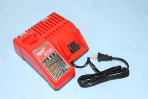 lot 55 image: Milwaukee M18 & M12 Multi-Voltage Cordless Battery Charger - Model 48-59-1812  - New