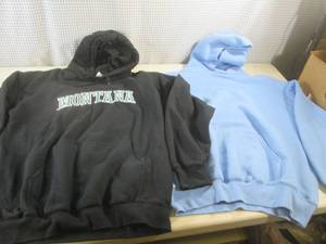 lot 55 image: (CS) 2 Pull Over Hoodies - Montana Size Large and Light Blue Size XL