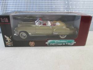 lot 102 image: (CSB) 1949 Cadillac Coupe de Ville Die-Cast Metal Replica in Box 118 Scale
