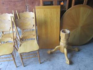 lot 205 image: (UD-1) Round Wood 48 Dining Room Table with 24 Leaf and 4 Chairs - One Chair Needs Repair - Unassembled For Transport