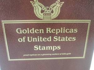 lot 215 image: (BS) Full Book of Golden Replicas of United States Stamps First Day Of Issue Proof Replicas On A Gleaming Surface of 22kt Gold