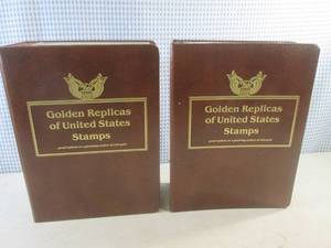 lot 217 image: (BS) Full and Partial Books of Golden Replicas of United States Stamps First Day Of Issue Proof Replicas On A Gleaming Surface of 22kt Gold