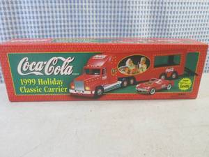 lot 228 image: (C-4) Coca-Cola Limited Edition 1999 Holiday Classic Carrier with 53 Classic Corvette Battery Operated Lights in Box