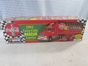 lot 229 image: (C-4) 2002 Coca-Cola Nascar Carrier with Collectible Race Car Over 270 Battery Operated Light in Box
