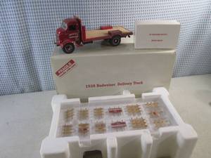 lot 239 image: (EW3) 1938 Budweiser Delivery Truck Diecast Metal Replica with 40 Genuine Wood Beer Kegs and Truck Bed Side and Rear Rails In Box