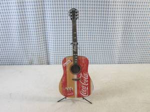 lot 252 image: (BS) Coca-Cola A Song and A Smile Guitar Collection A Refreshing Time with Stand