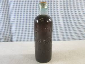 lot 270 image: (BS) 1899 Beginning of Refreshment Bottle Figure from the The Coca-Cola Replica Bottle Collection 8 Tall