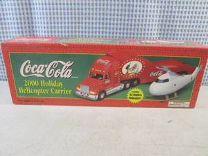 lot 272 image: (C-4) Coca-Cola Limited Edition 2000 Holiday Helicopter Carrier Includes 62 Replica Helicopter Battery Operated Lights and Helicopter Rotor in Box