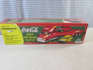 lot 274 image: (C-4) Coca-Cola 2003 Off-Road Carrier Includes 2 Die-Cast Friction Powered Hummer H2 Vehicles Realistic Horn and Engine Sounds Working Lights in Box