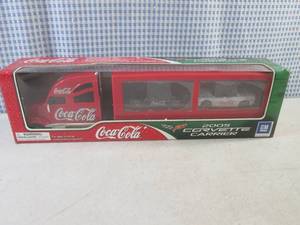 lot 275 image: (C-4) Coca-Cola 2005 Crvette Carrier with 143 Scale Diecast C6 Hardtop and C6 Convertable Corvettes in Box