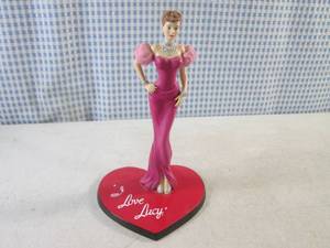 lot 284 image: (BS) I Love Lucy Rickys Movie Offer Figure from the I Love Lucy 65th Anniversary An Episode of Fashion Collection 7 12 Tall