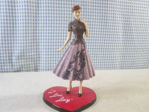 lot 288 image: (BS) I Love Lucy Hollywood Anniversary Figure from the I Love Lucy 65th Anniversary An Episode of Fashion Collection 7 12 Tall