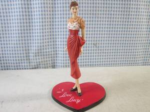 lot 301 image: (CSB) I Love Lucy The Celebrity Next Door Figure from the I Love Lucy 65th Anniversary An Episode of Fashion Collection 7 12 Tall