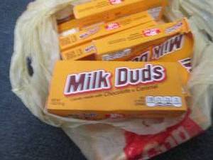 12- 5 oz Milk Duds...