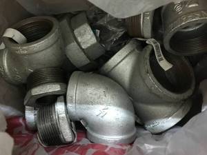 lot 98 image: GALVENIZED PLUMBING FITTINGS