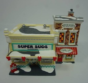 lot 79 image: Department 56 The Original Snow Village Collection Super Suds Laundromat #56.55006 Year 1999
