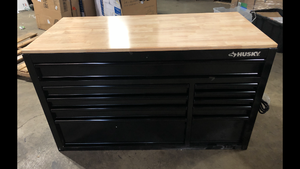 Husky 52 in. W x 24.5 in. D Standard 10-Drawer Mobile Workbench Tool Chest with Solid Wood Top in Gloss Black   Customer Returns See Pictures