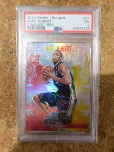 lot 143 image: PSA 7 2013 Panini Crusade Red Rudy Gobert Rookie Card #51