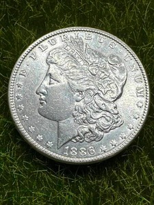 lot 19 image: 1886 Morgan Silver Dollar