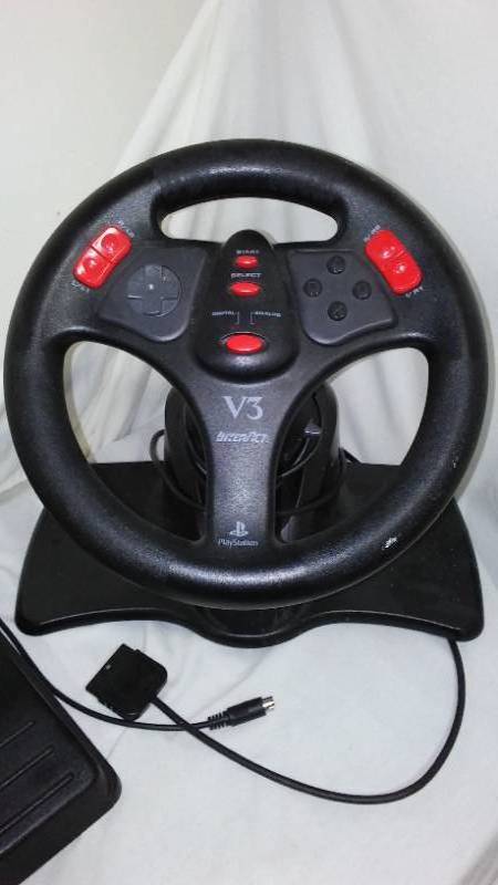 lot 604 image: V3 Racing Wheel for PlayStation.