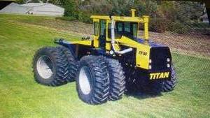 lot 36 image: ERTL Steiger Body Titan STR-360, Toy Farmer.