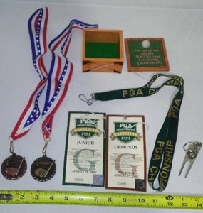 lot 59 image: Golf Theme, PGA Lanyard, Tickets And More.
