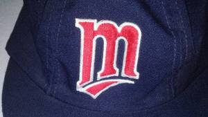 lot 68 image: Kirby Puckett Glove And Kids Hats.