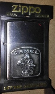 lot 155 image: Camel Zippo Lighter New In Case.