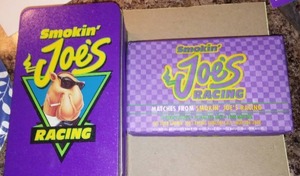 lot 157 image: Smokin Joes Racing Camel Matchbooks In Tin- NEW.